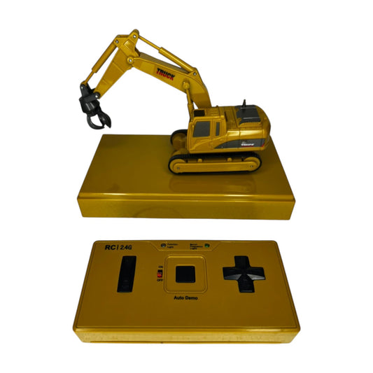 Mini excavadora con garra hidráulica 1/64 a control remoto.